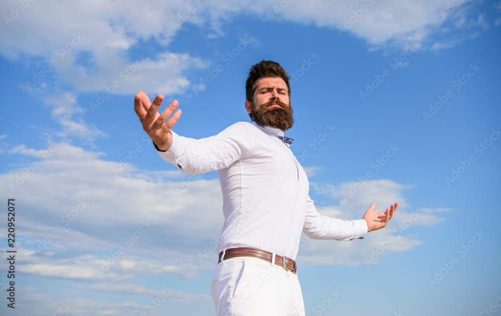 Reached top. Hipster with beard and mustache looks attractive fashionable white shirt. Guy enjoy top achievement. Man bearded hipster formal clothes looks sharp sky background. Power and freedom Reached top. Hipster with beard and mustache looks attractive fashionable white shirt. Guy enjoy top achievement. Man bearded hipster formal clothes looks sharp sky background. Power and freedom