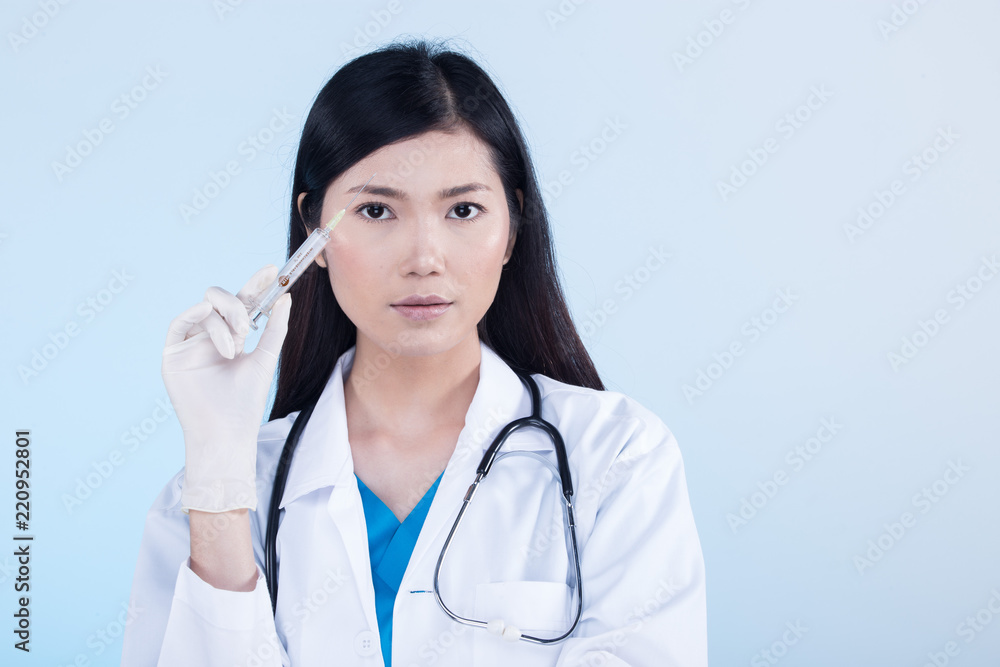 Doctor Nurse in white blue shirt with stethoscope and rubber gloves Doctor Nurse in white blue shirt with stethoscope and rubber gloves