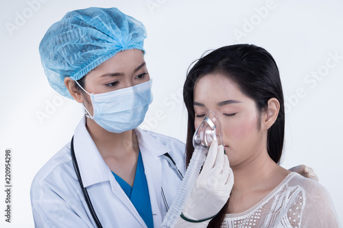 Doctor Nurse in white blue shirt with stethoscope and rubber gloves