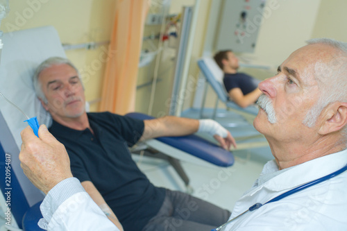 doctor with senior patient