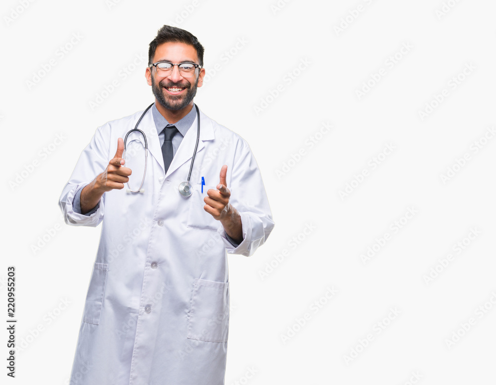 Adult hispanic doctor man over isolated background pointing fingers to camera with happy and funny face. Good energy and vibes. Adult hispanic doctor man over isolated background pointing fingers to camera with happy and funny face. Good energy and vibes.