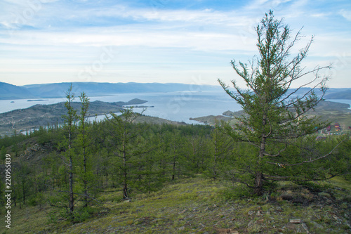View at lake Baikal over larch trees.