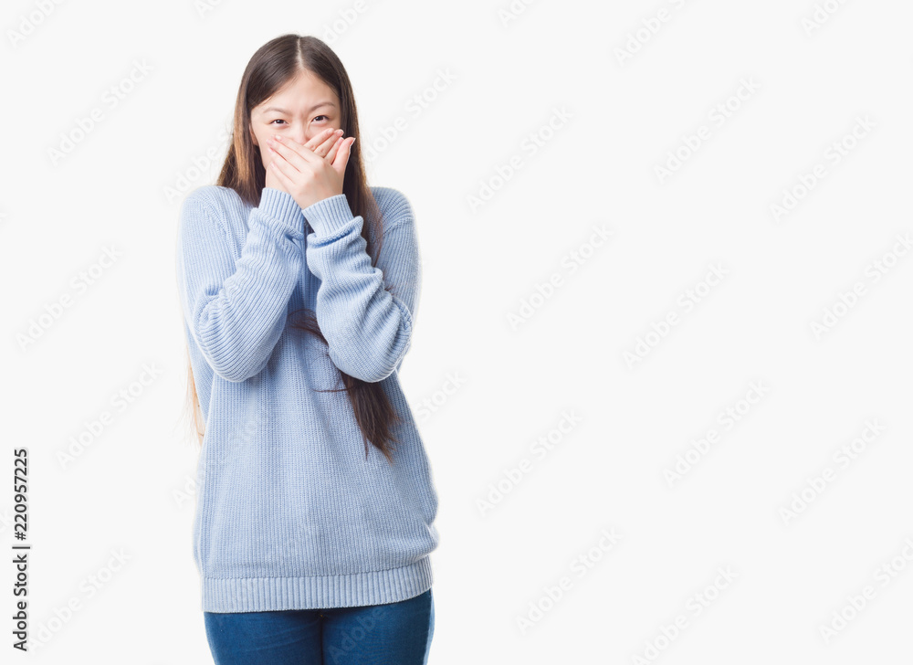 Young Chinese woman over isolated background shocked covering mouth with hands for mistake. Secret concept. Young Chinese woman over isolated background shocked covering mouth with hands for mistake. Secret concept.
