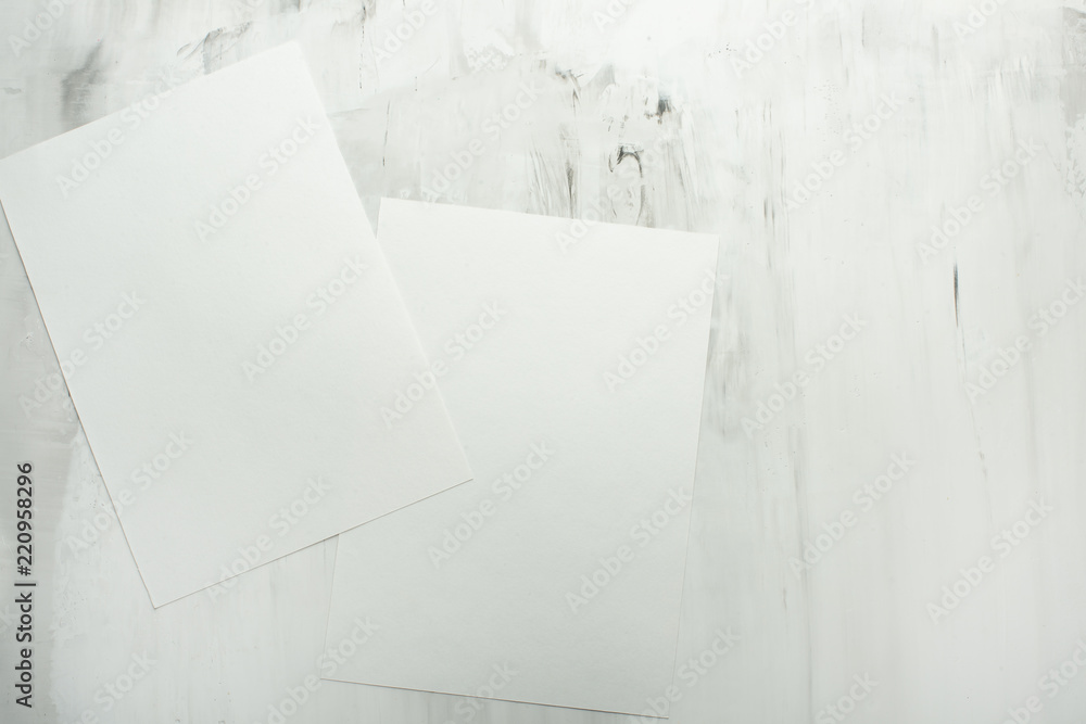 Empty white frame on the wall background. The concept of design and font inscriptions and image placement Empty white frame on the wall background. The concept of design and font inscriptions and image placement