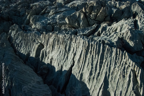 Small karst features (small-scale landforms) as grikes, runnels and solution flutes are formed from the dissolution of soluble rocks such as limestone and dolomite.  photo