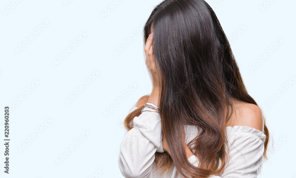 Young asian woman over isolated background with sad expression covering face with hands while crying. Depression concept. Young asian woman over isolated background with sad expression covering face with hands while crying. Depression concept.