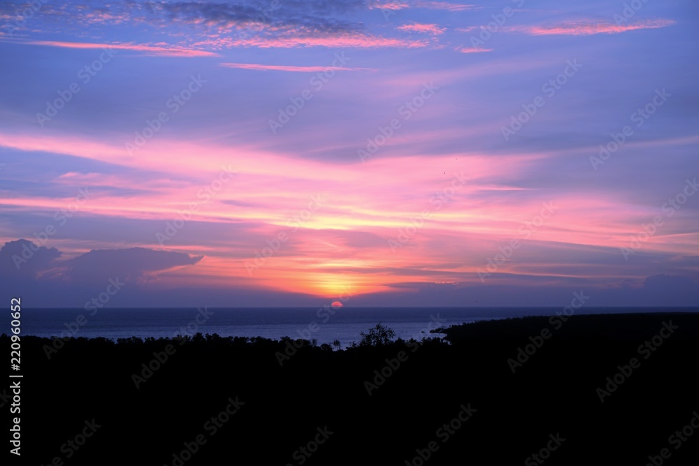 Sunset and dramatic sky with sea background.