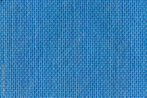 Close up on blue background made up of threads