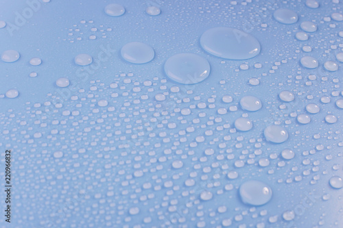 Wallpaper Mural Close up of waterdrop on blue background. Torontodigital.ca