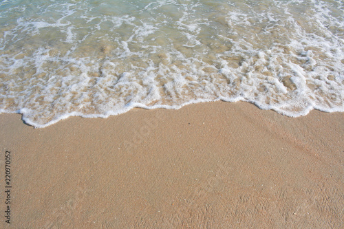 Sea water, sand and wave © Renata