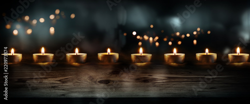 Candles on dark blue background