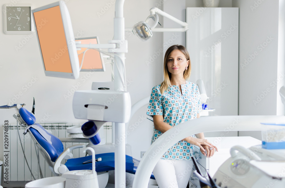 Portrait of female dentist in office Portrait of female dentist in office