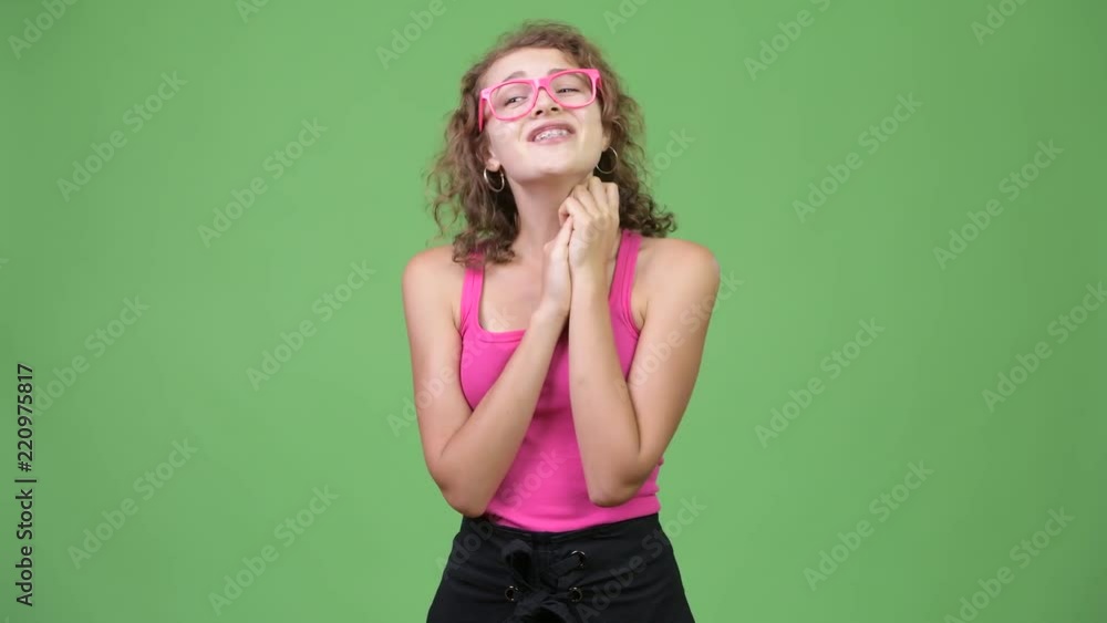 Young happy beautiful nerd woman clapping hands Young happy beautiful nerd woman clapping hands