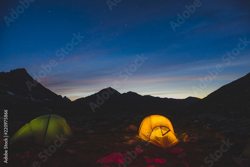 Night landscape. Tents in Altai mountains. Akchan valley photo