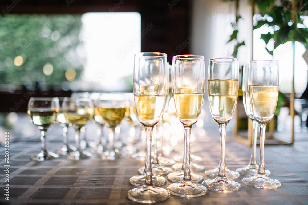 Festive table setting with champagne. champagne glasses close up