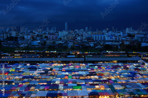 Colorful city market at asian bangkok  city light at night. Dark blue black color.