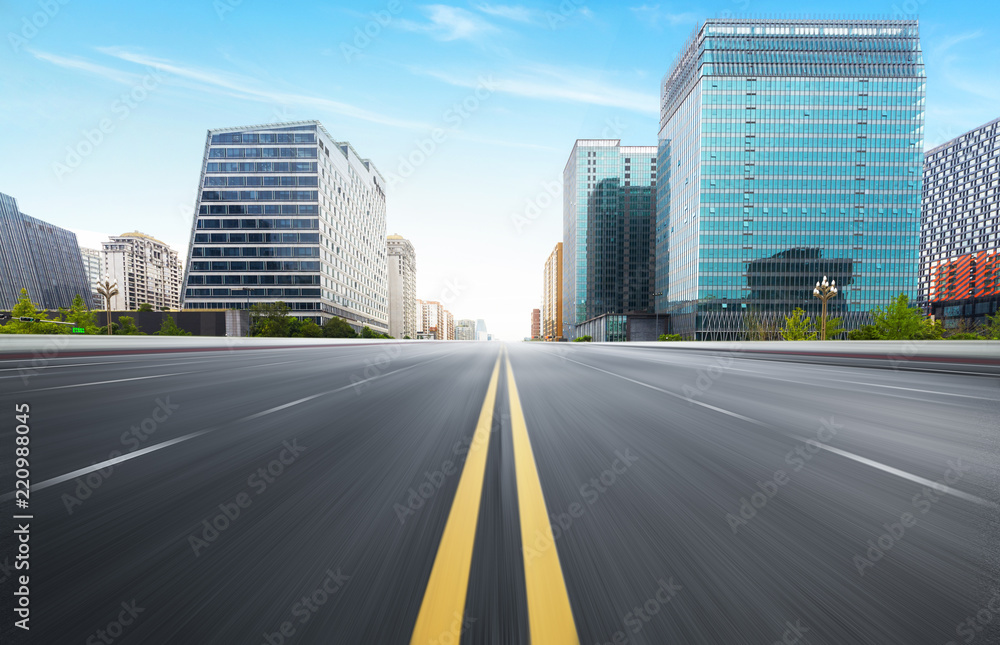 The expressway and the modern city skyline are in Chongqing, China.