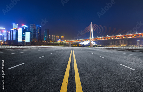 The expressway and the modern city skyline are in Chongqin.g, China