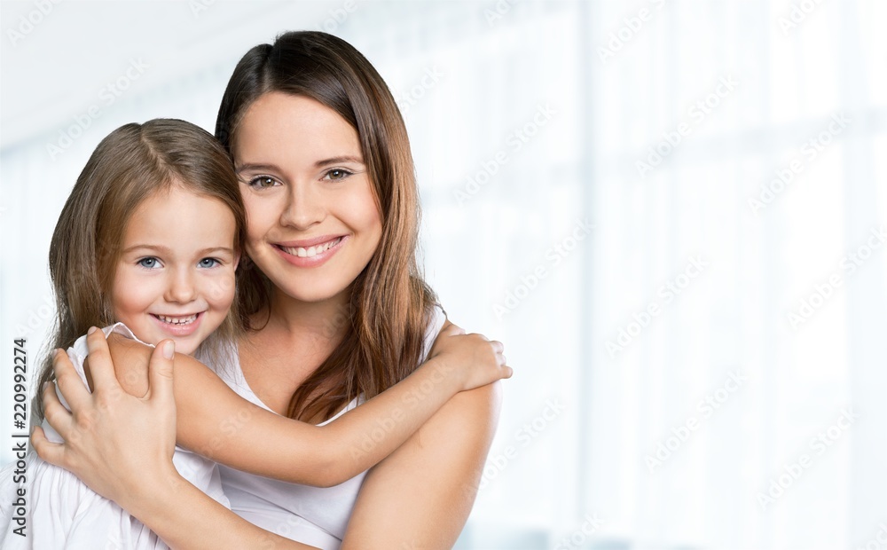 Happy Mother and daughter hugging Happy Mother and daughter hugging