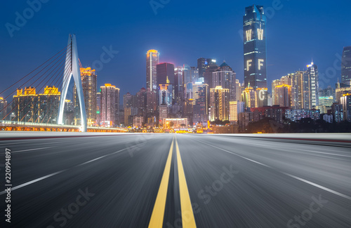 The expressway and the modern city skyline are in Chongqin.g  China