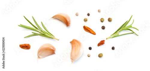 Different spices on white.