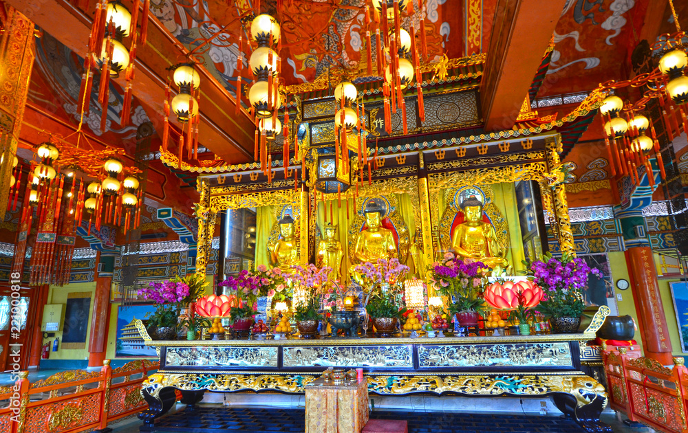 Colourful Interior of the Po Lin monastery Temple, Sutra verses on walls and Ceiling. Lantau Island, Hong Kong, China Colourful Interior of the Po Lin monastery Temple, Sutra verses on walls and Ceiling. Lantau Island, Hong Kong, China