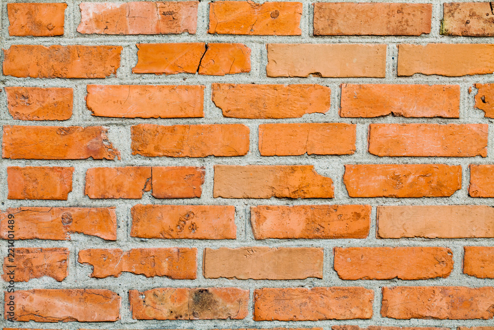 Obraz premium Aged orange brick wall pattern frame. Vintage brickwork abstract object, white seam.