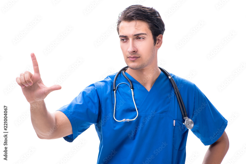 Young male doctor pressing buttons isolated on white Young male doctor pressing buttons isolated on white