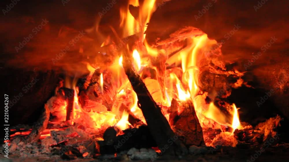 Fire wood brighly burning in furnace. Fire and flames Fire wood brighly burning in furnace. Fire and flames