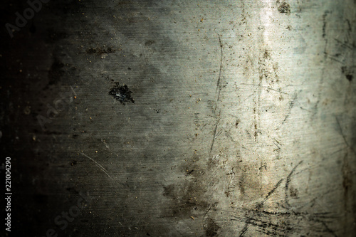 Grungy scratched stainless steel surface for graphic design and backdrop or textures for game developers.