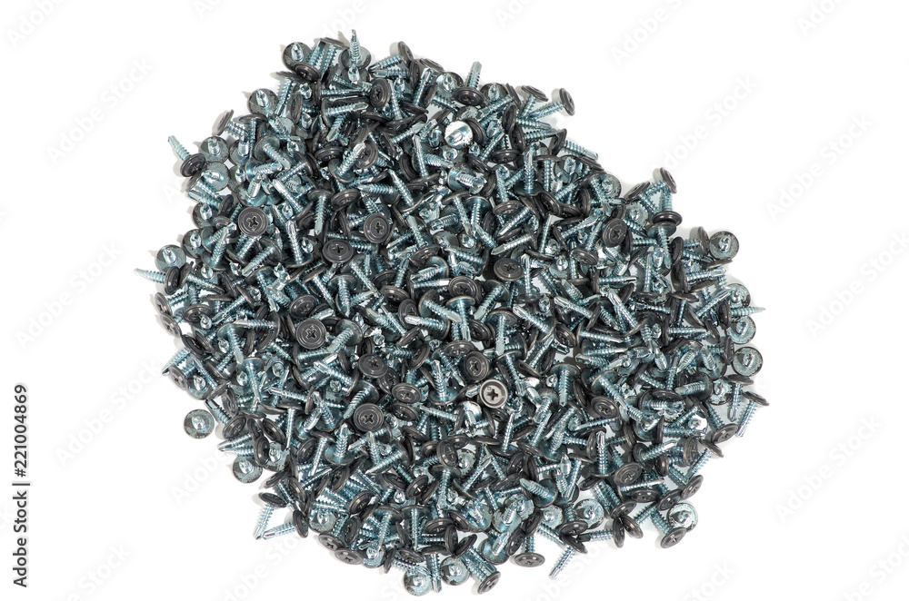 many gray screws scattered on a white background