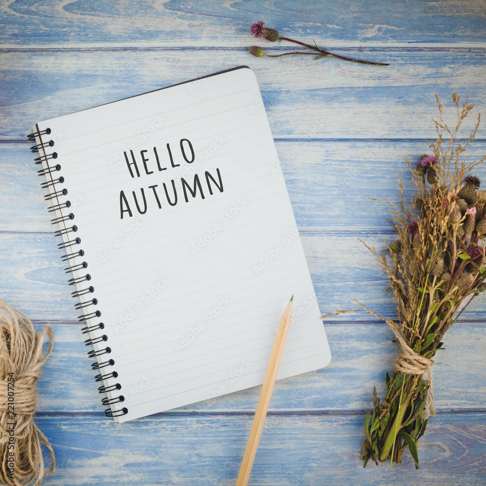 Notebook with pencil and autumn flowers Notebook with pencil and autumn flowers
