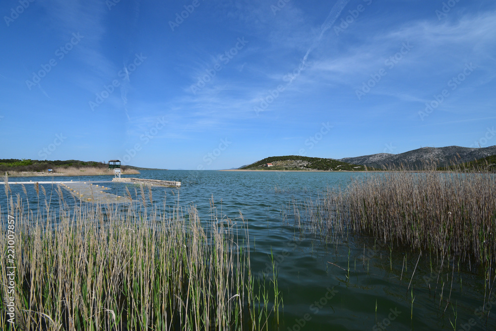 Lake Vrana (Vransko jezero) in Dalmatia is the largest lake in Croatia. The lake is in a karst valley and is a rare example cryptodepression. Park is a special ornithological reserve. Lake Vrana (Vransko jezero) in Dalmatia is the largest lake in Croatia. The lake is in a karst valley and is a rare example cryptodepression. Park is a special ornithological reserve.