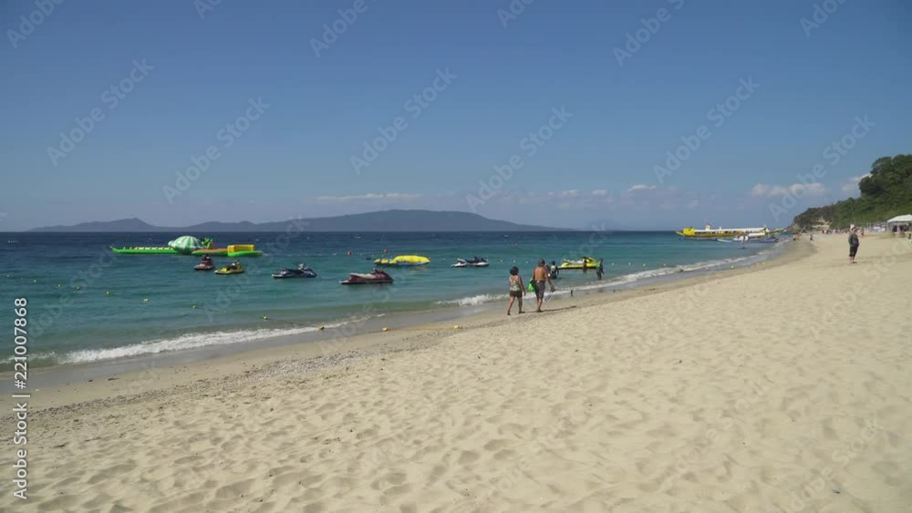 Beautiful tropical beach with white sand. White Beach, Philippines, Mindoro Beautiful tropical beach with white sand. White Beach, Philippines, Mindoro