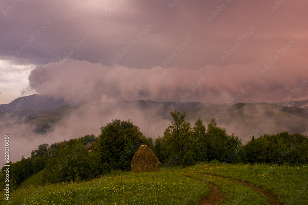 Beautiful from the nature with fog and clouds at sunset