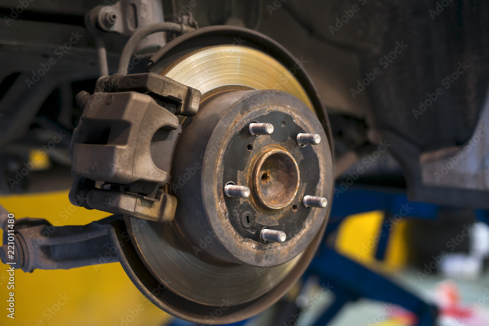 Car brake disc without wheels closeup.