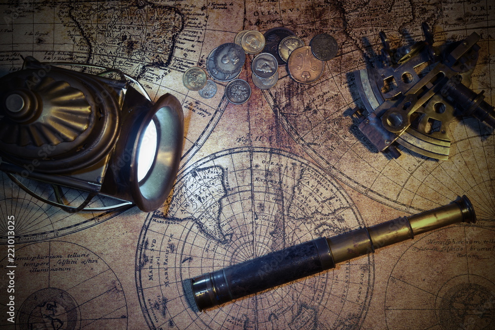 Ship lantern, compass, old coins and sextants. Travel and marine engraving background.Pirate map. Retro style.