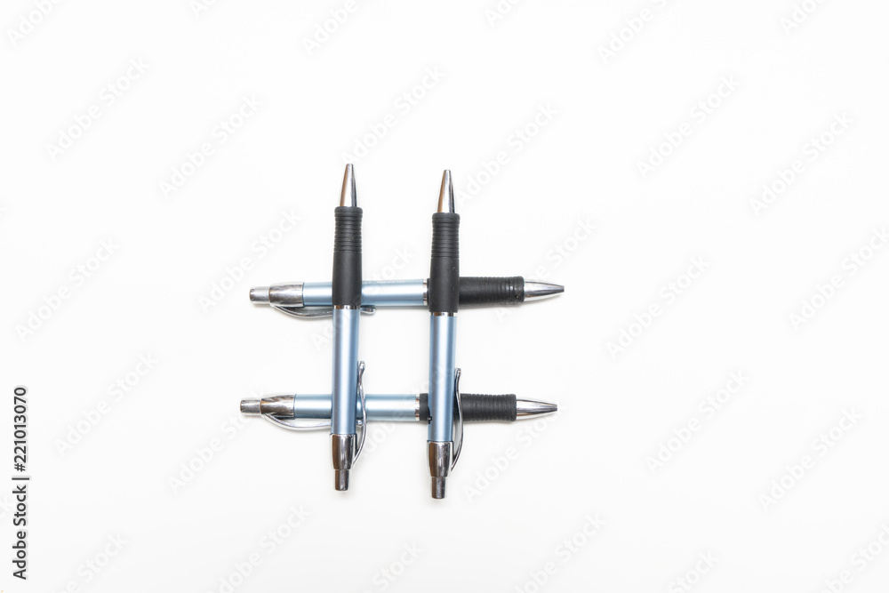 the symbol of the pound sign on a white surface the symbol of the pound sign on a white surface