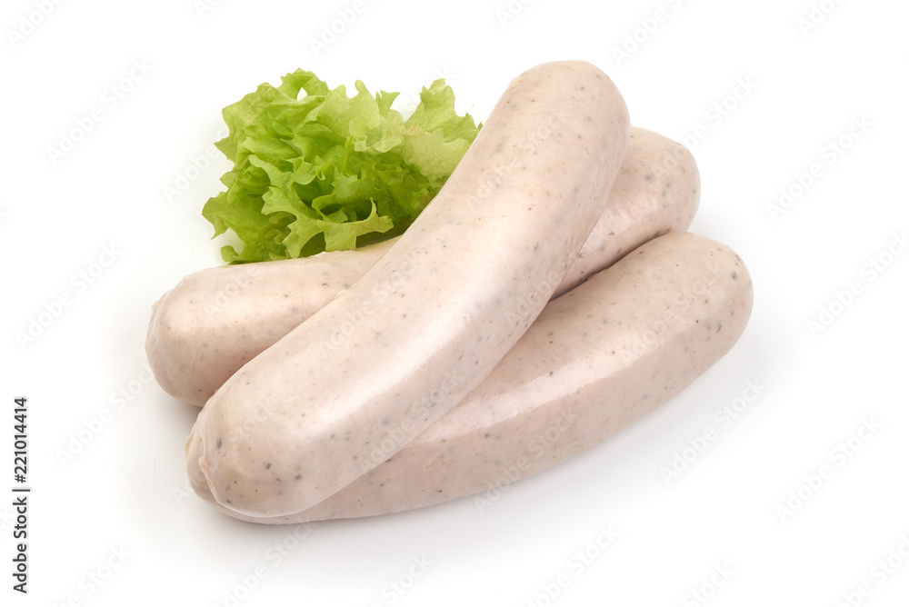 Bavarian meal. Original White sausages with green lettuce. Bavarian meal. Original White sausages with green lettuce.