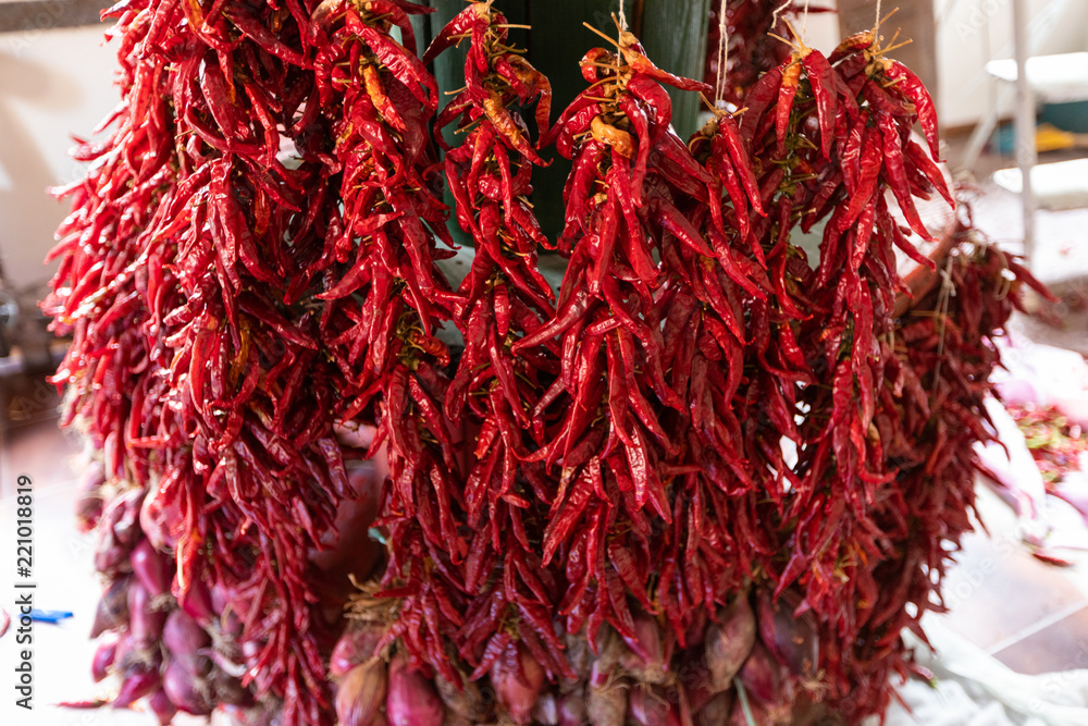 Naklejka premium sweet and spicy peppers, called Pipi, typical product of southern Italy, Orsomarso, Calabria, Italy