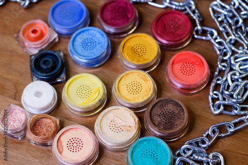 Colorful eyeshadow on the table. Professional set of make-up. © PAVEL GERASIMENKO