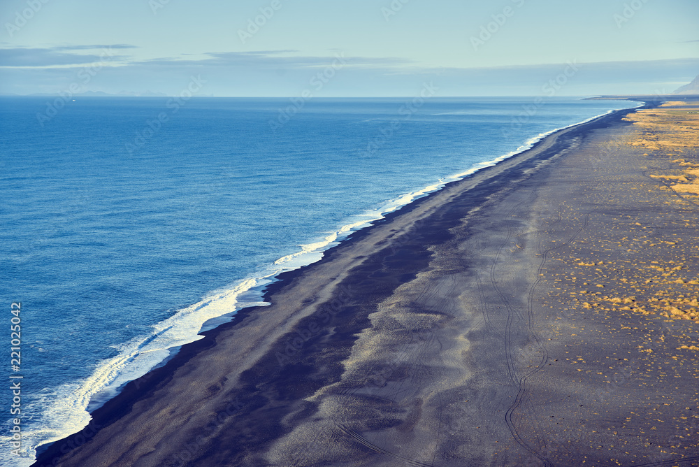 View from the heights to the shore with black sand in Iceland