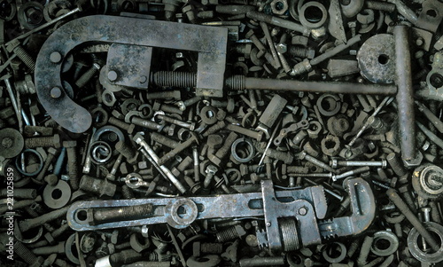 Instrument tool kit.Spanner.Bolt and screws in the background