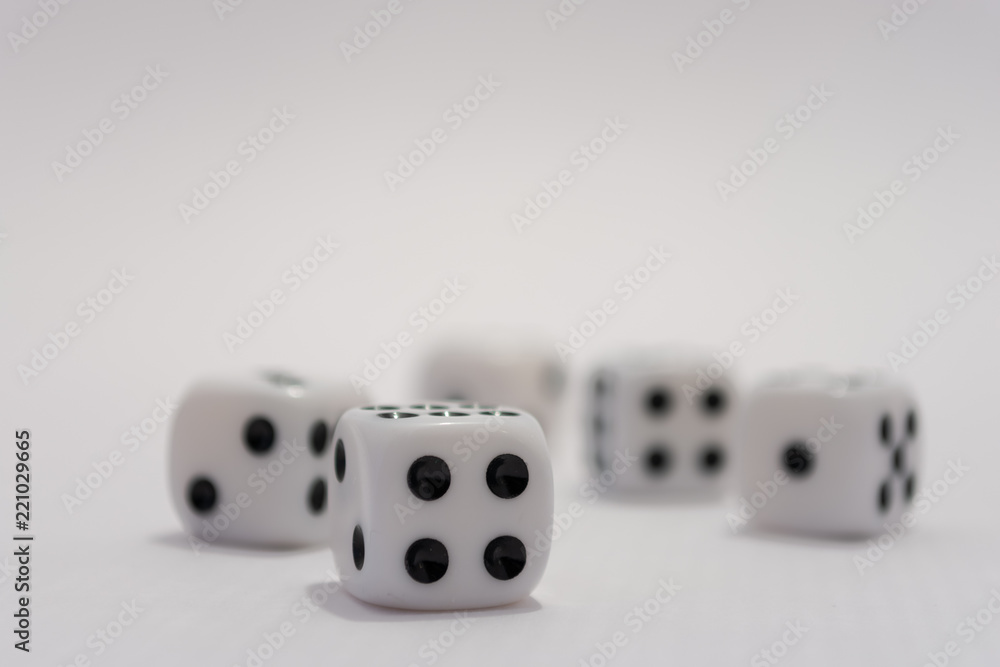 White dice with black dots on white background White dice with black dots on white background