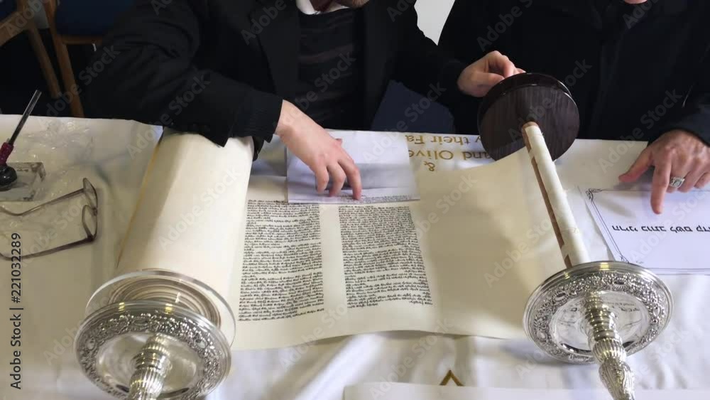 Jewish Man Holding Sofer Hand While He Writing A Sefer Torah In Hebrew ...