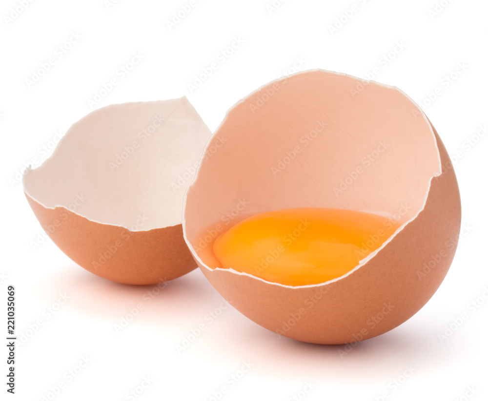 Broken egg in eggshell half isolated on white background cutout Broken egg in eggshell half isolated on white background cutout
