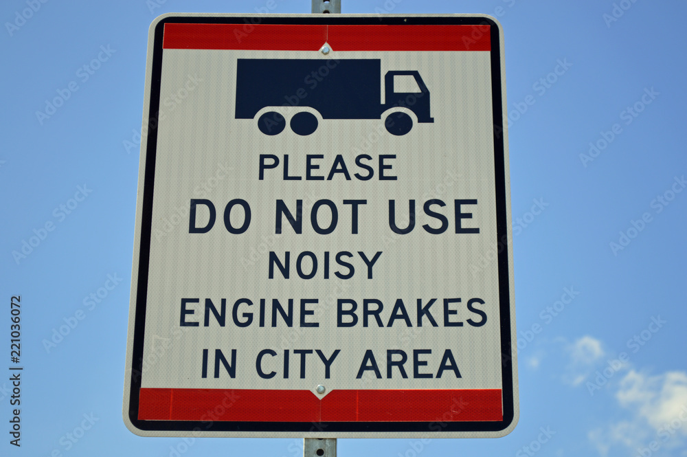 Sign informing truck drivers to not use engine brakes in the city Sign informing truck drivers to not use engine brakes in the city