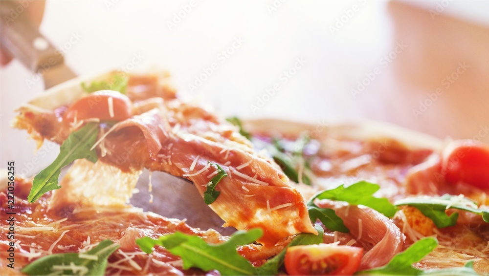 Closeup of a Pizza with Ham Closeup of a Pizza with Ham