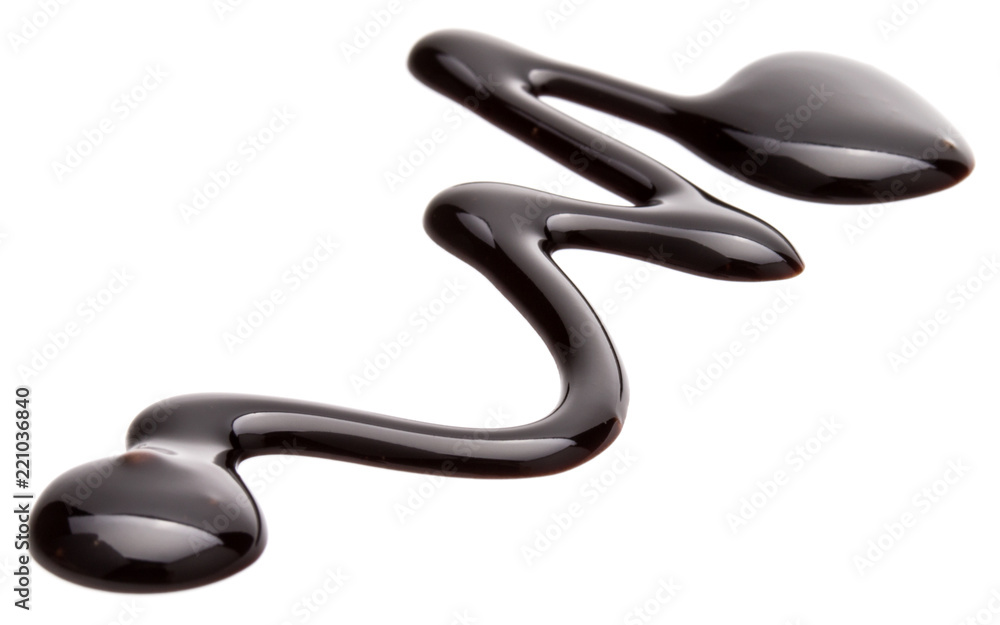 Chocolate syrup drop isolated on white background Chocolate syrup drop isolated on white background