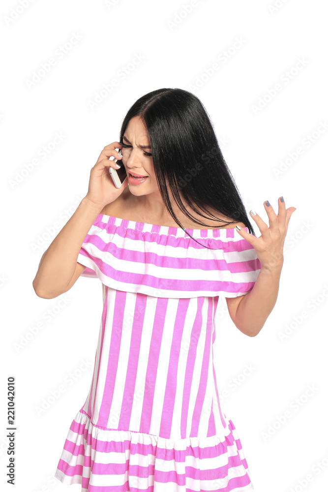 Beautiful woman talking on phone against white background Beautiful woman talking on phone against white background